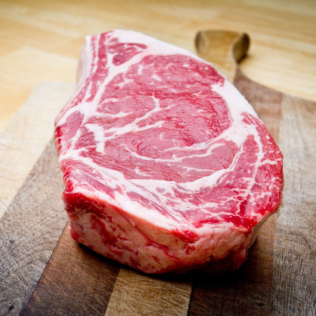 1 lb Creekstone Farms Premium Dry Aged Bone in Steak, with Rich's Steak Seasoning Blend