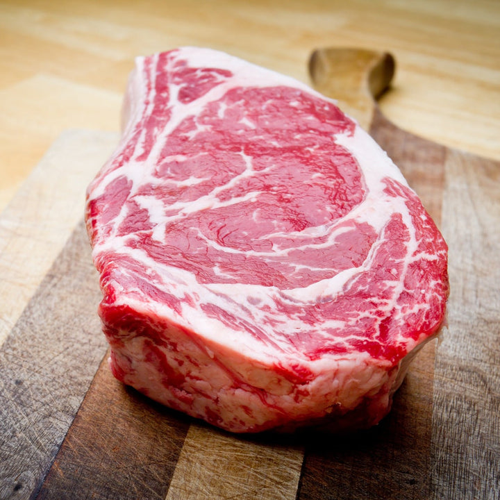 1 lb Creekstone Farms Premium Dry Aged Bone in Steak, with Rich's Steak Seasoning Blend